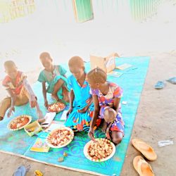 Community meal shared at the new school.