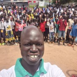 South Sudan board member Theng Tut visiting a school for orphans near the capital city of Juba.